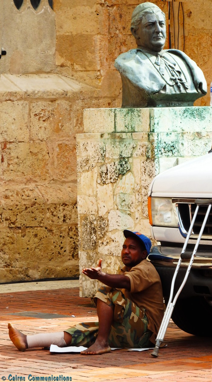 Alms for the poor outside a cathedral